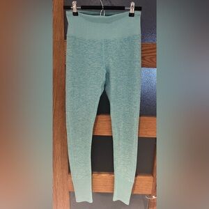 ALO YOGA Size M Heathered Blue Leggings with Ribbed waist and ankles.